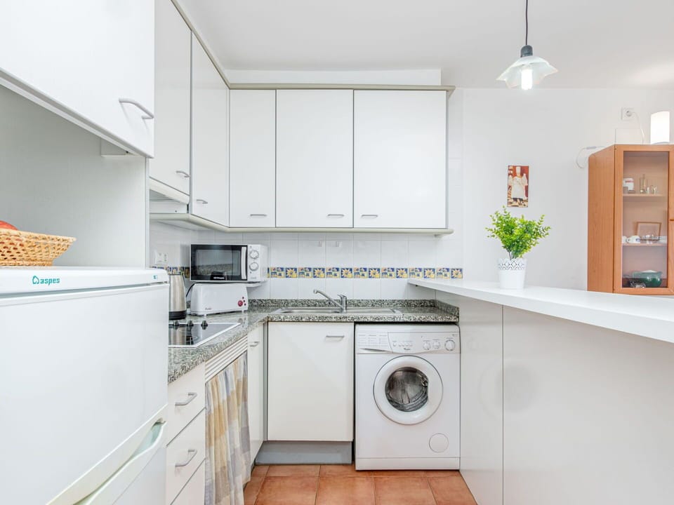 Cabinetry, Countertop, Property, Kitchen Appliance, Kitchen Stove, Kitchen, Home Appliance, Interior Design, Building, Wood