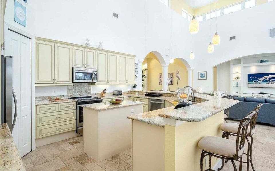 Oversized Kitchen with Stainless Steel Appliances