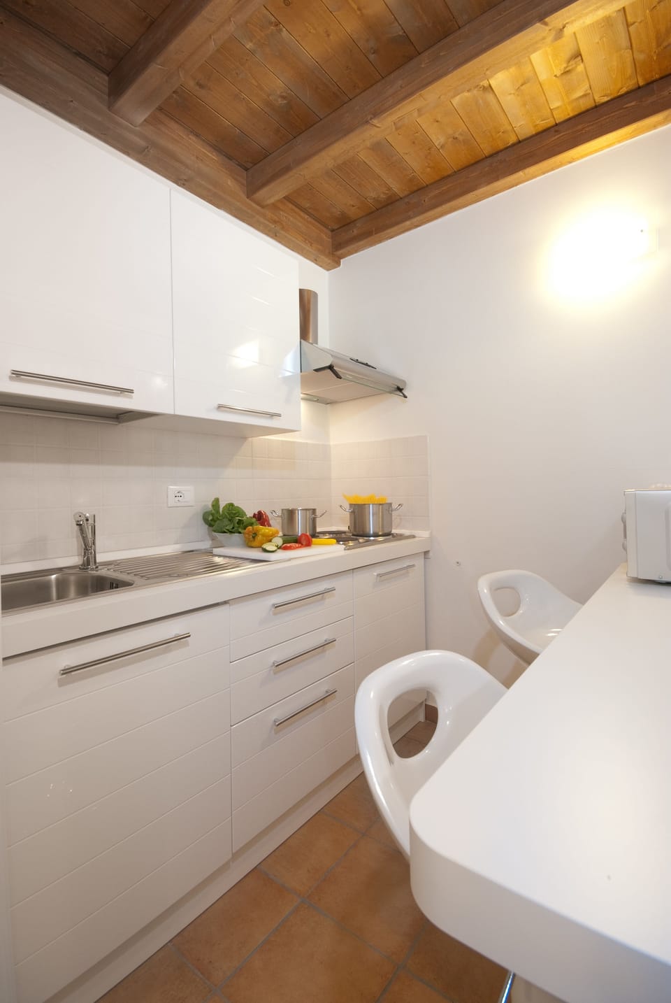 Full-size fridge, microwave, espresso maker, coffee/tea maker