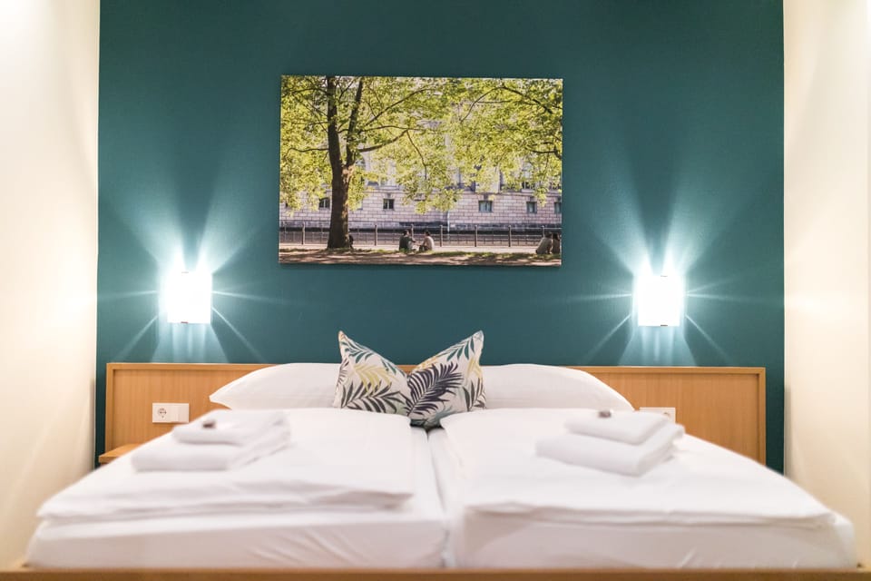 Double or Twin Room | Desk, blackout drapes, free WiFi, bed sheets