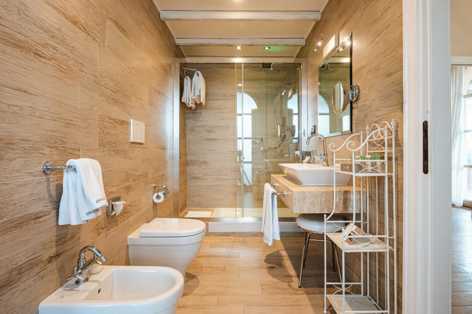 Junior Suite, Sea Facing | Bathroom | Shower, rainfall showerhead, free toiletries, hair dryer