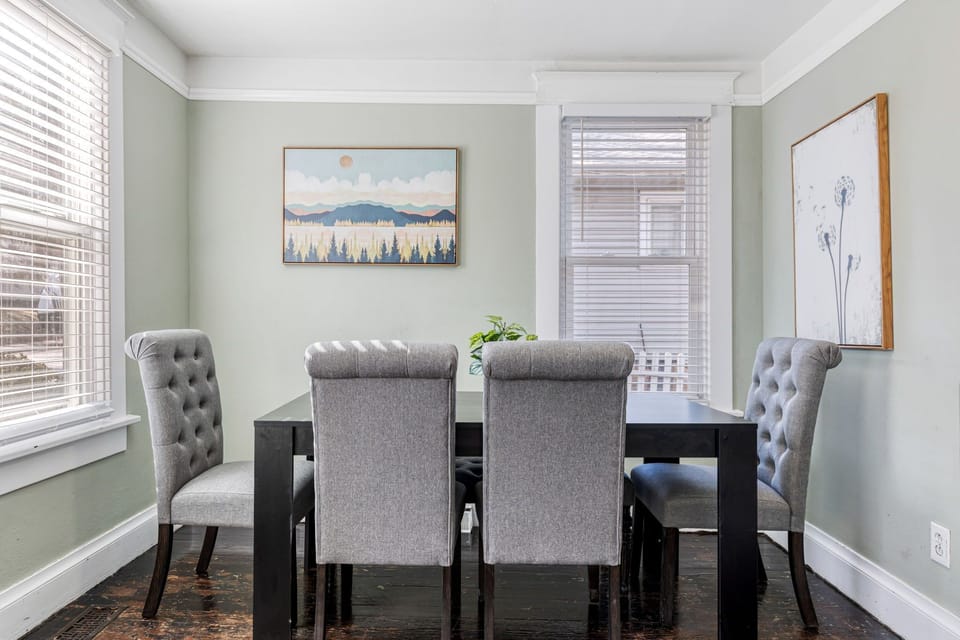 The dedicated dining area provides a comfortable setting for shared meals.