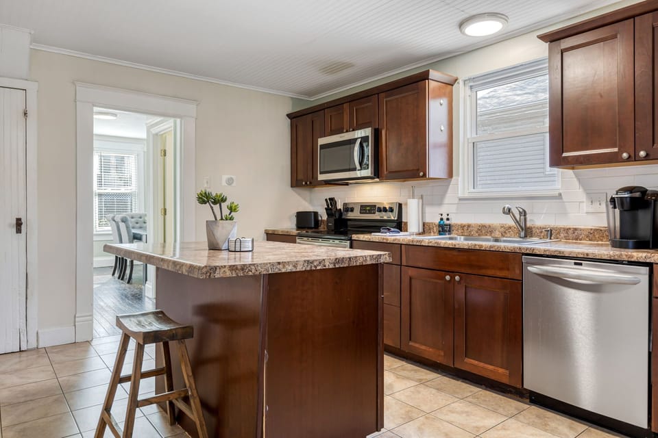 Generous counters and full-size appliances make meal preparation easy.