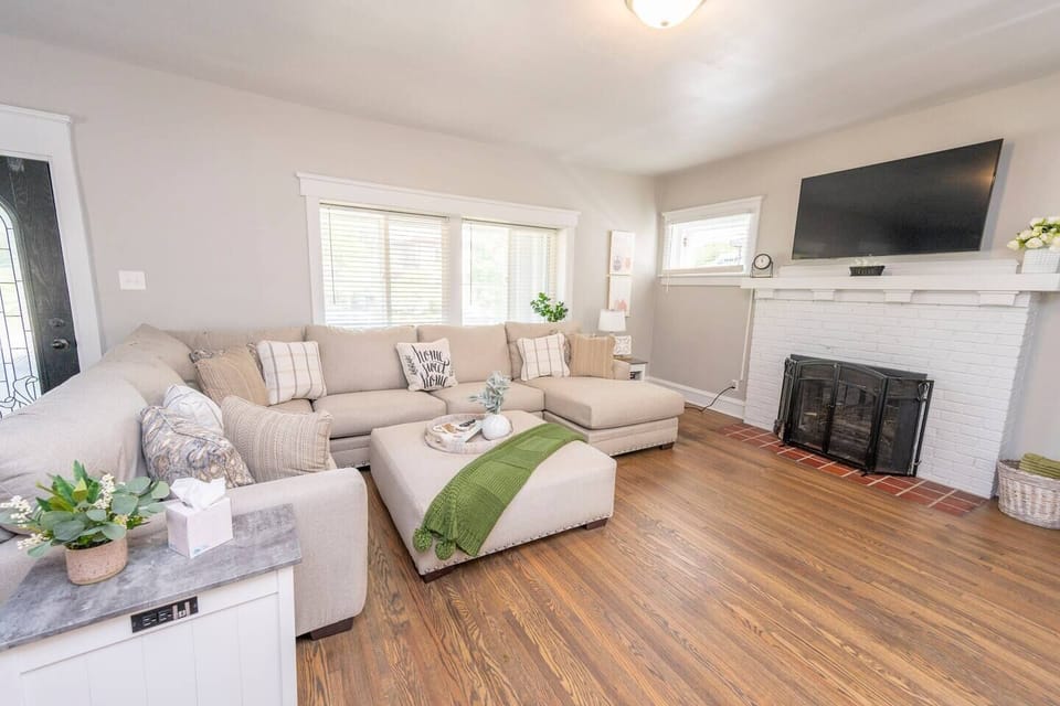 Relax in the spacious, ultra-comfortable living room. Note the built-in charging station at lower left.
