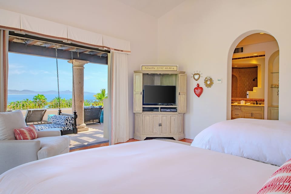 Bedroom 3 · Wake up to breathtaking ocean views from your plush bed, with your own private terrace just steps away—where tropical breezes and endless blue horizons greet you each morning.