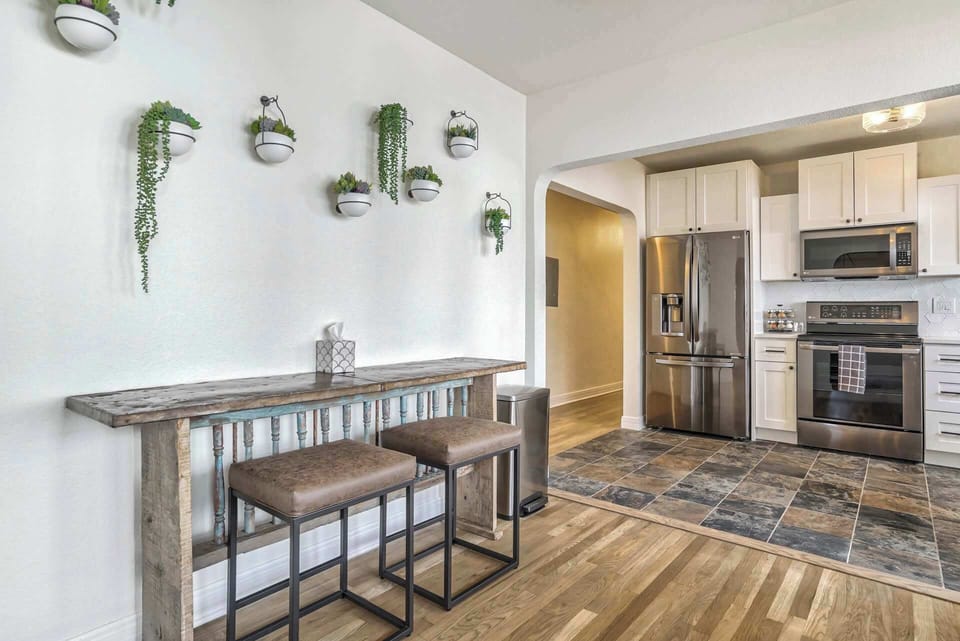 Enjoy casual dining at the cozy breakfast bar with stylish decor