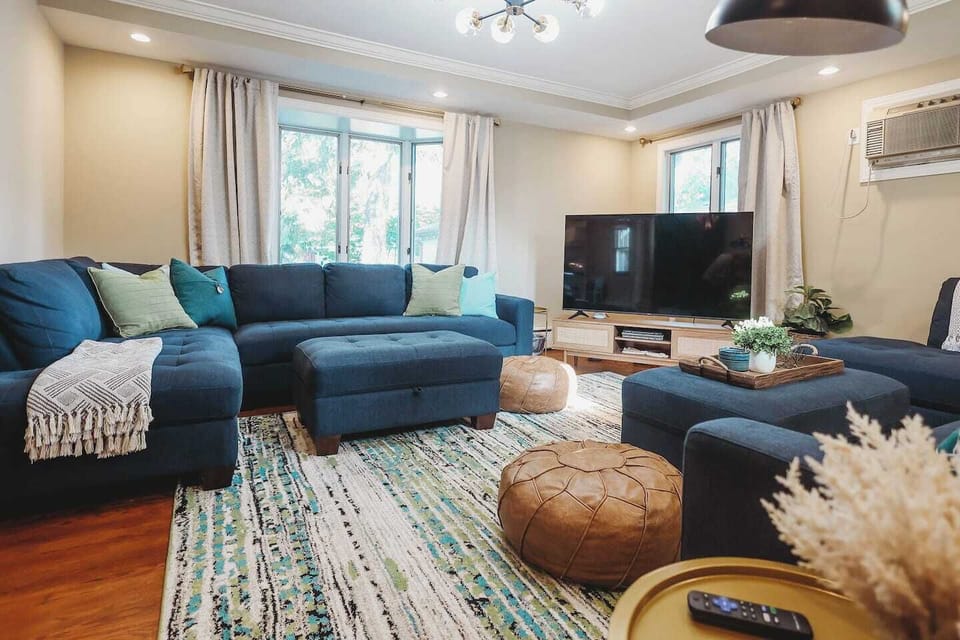 Plenty of room to plop down on the couch and veg out if its gloomy out, or just enjoy the sunshine coming in from the bay window.