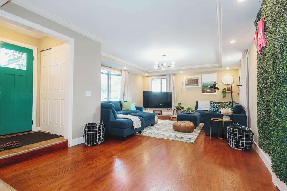 Our main living room in the back features two large couches and a 65" Roku TV for guests to sign into their Netflix accounts and veg out! 

Saturday morning cartoons anyone..? 