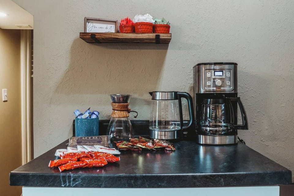 Who Needs Coffee? Drip Coffee Maker, a Cosori Pour Over Coffee Maker, filters, various sweeteners and creamer for your morning coffee! We also have an electric kettle to brew water for your  tea.