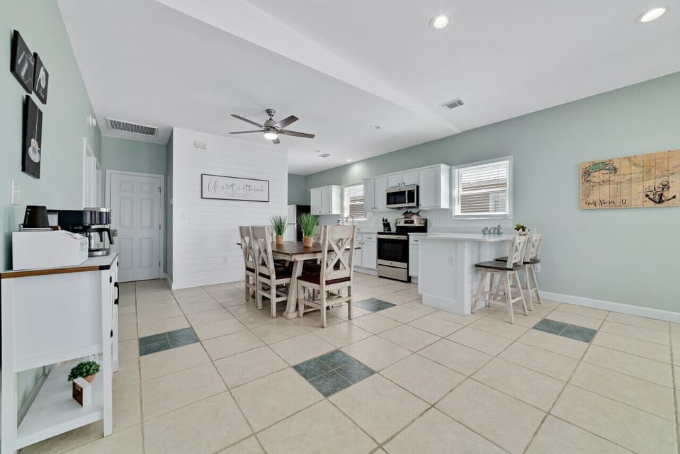 Dining space right off the kitchen with additional bar seating