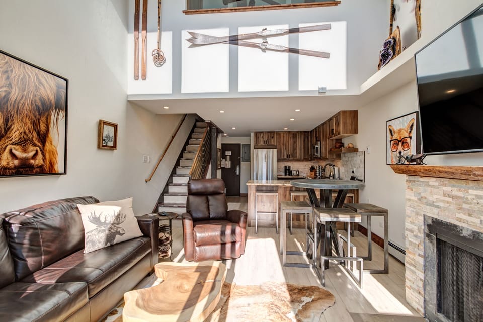 Open concept living space with 1/2 bath. 2 bedrooms and 2 full baths upstairs.