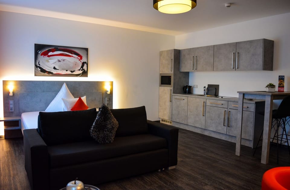 Apartment, 1 Bedroom, Kitchenette | Hypo-allergenic bedding, minibar, in-room safe, desk