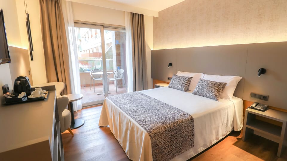 Double Room, Pool View | In-room safe, desk, free cribs/infant beds, free WiFi