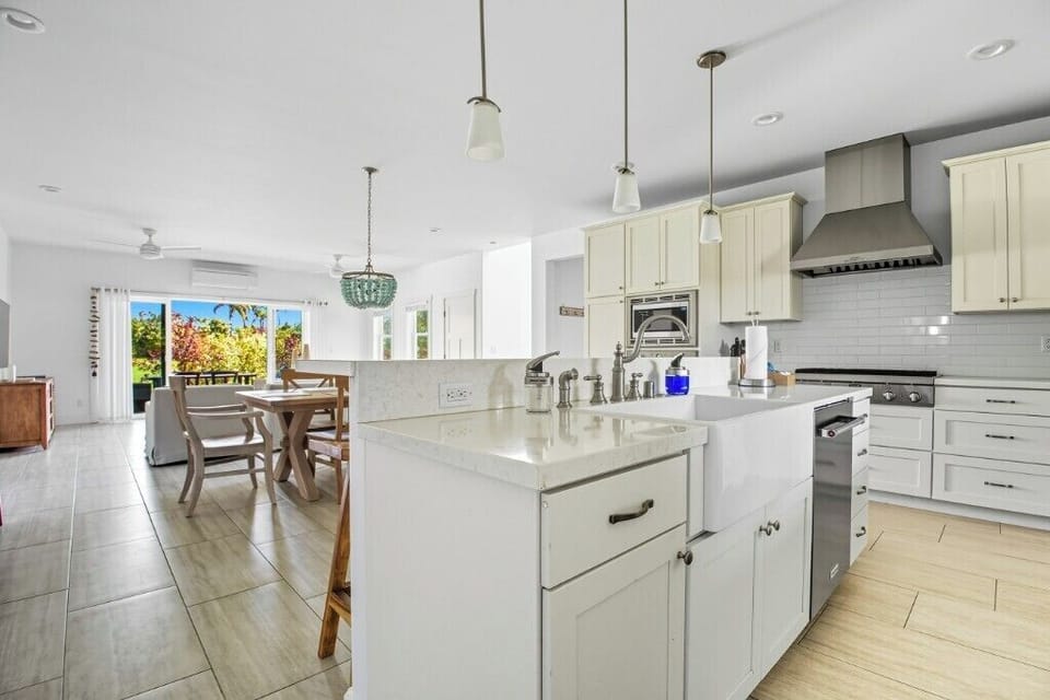 Kitchen island view into the open living area