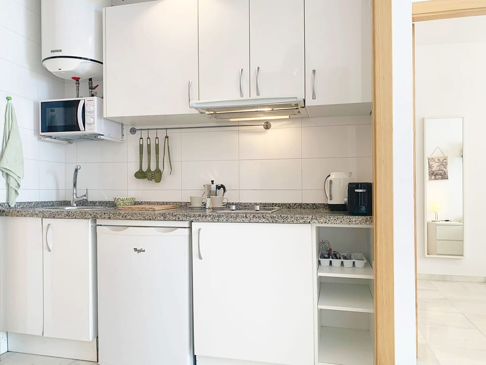 A comfortable kitchen, perfect for cooking and enjoying with friends and family in an open-concept space