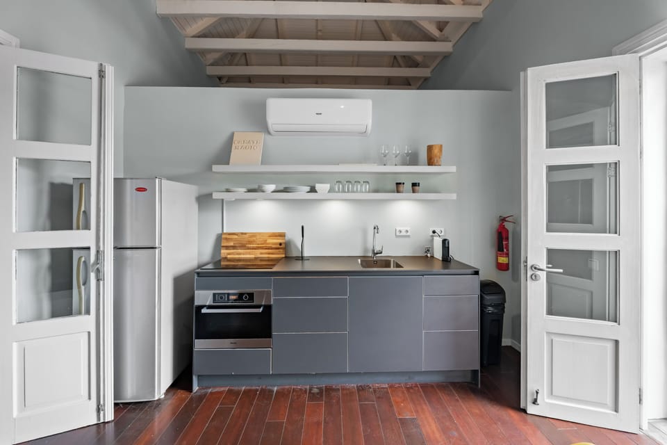 Comfort Apartment, 1 Bedroom, City View | Private kitchen | Espresso maker, mini-fridge, highchair