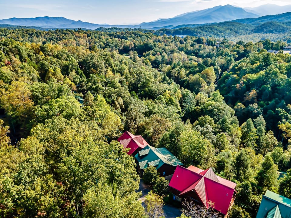 Morning Star cabin is the green roof in between the red roof cabins.