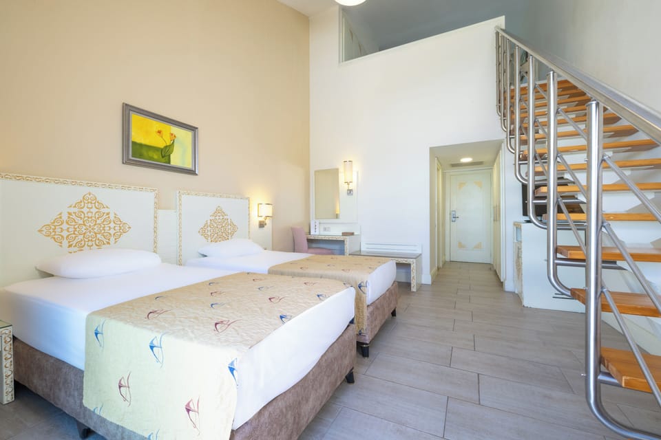 Premium bedding, free minibar, in-room safe, desk