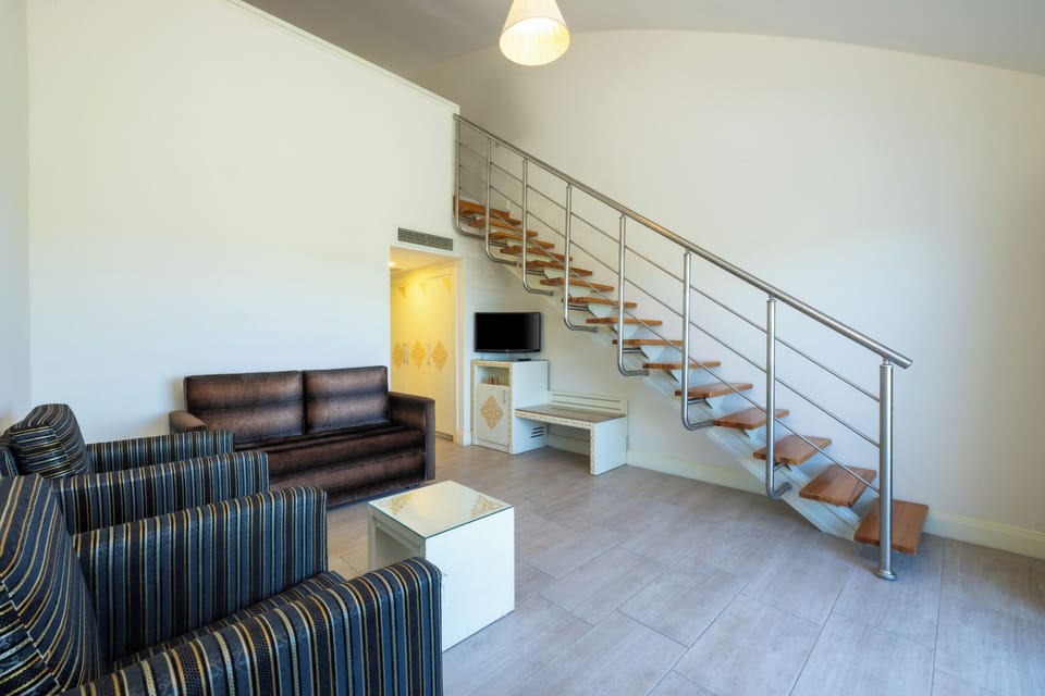 Family Duplex, 2 Bedrooms, Partial Sea View | Premium bedding, free minibar, in-room safe, desk