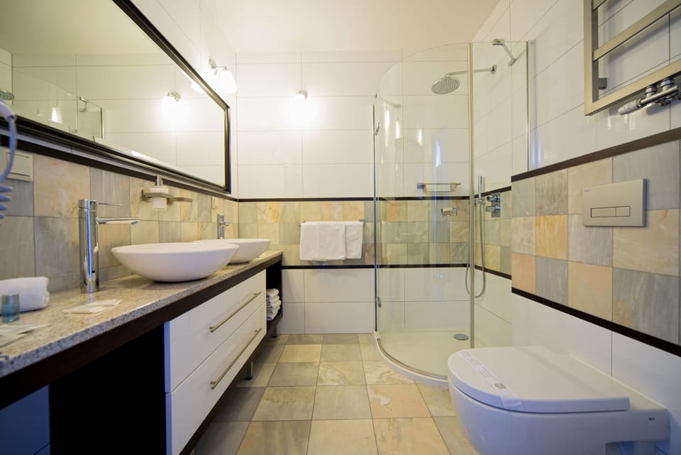 Executive Suite, 2 Bedrooms, Terrace | Bathroom | Shower, free toiletries, hair dryer, towels