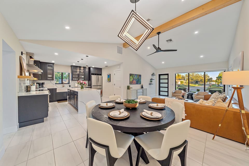 The dining table is from RH and the overhead lighting/chandelier are dimmable.