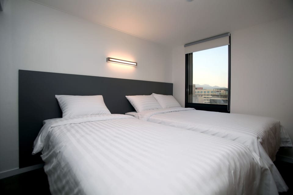 Blackout drapes, free WiFi, bed sheets