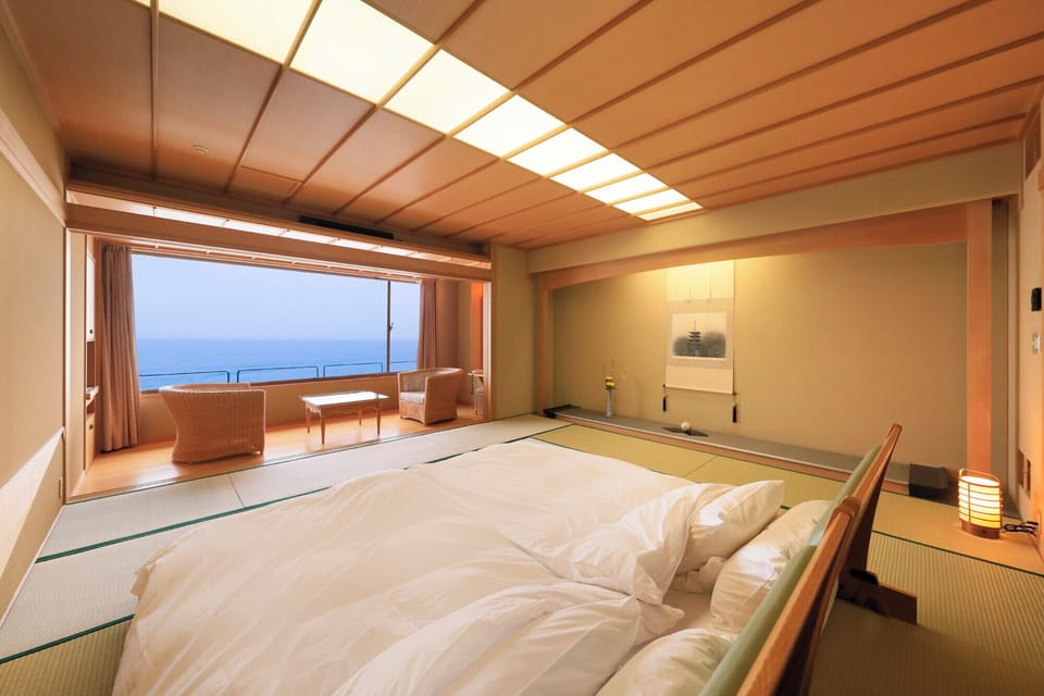 Family Room with Private Bathroom, Non Smoking | Minibar, desk, bed sheets