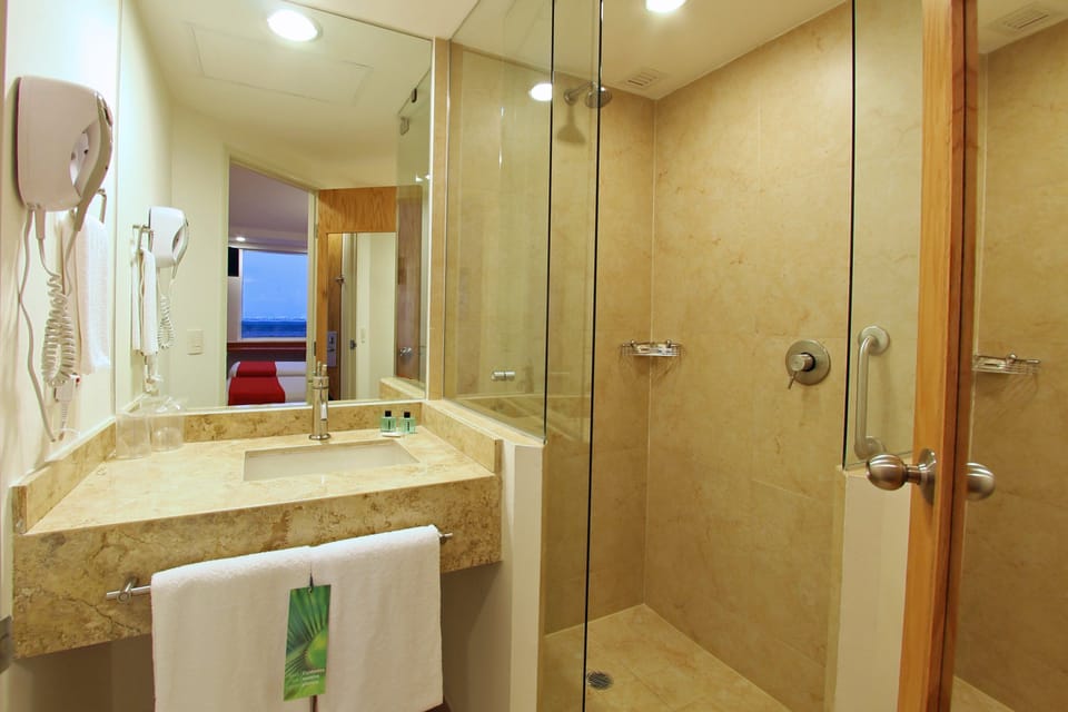 Standard Twin Room, 2 Twin Beds | Bathroom | Shower, eco-friendly toiletries, hair dryer, towels