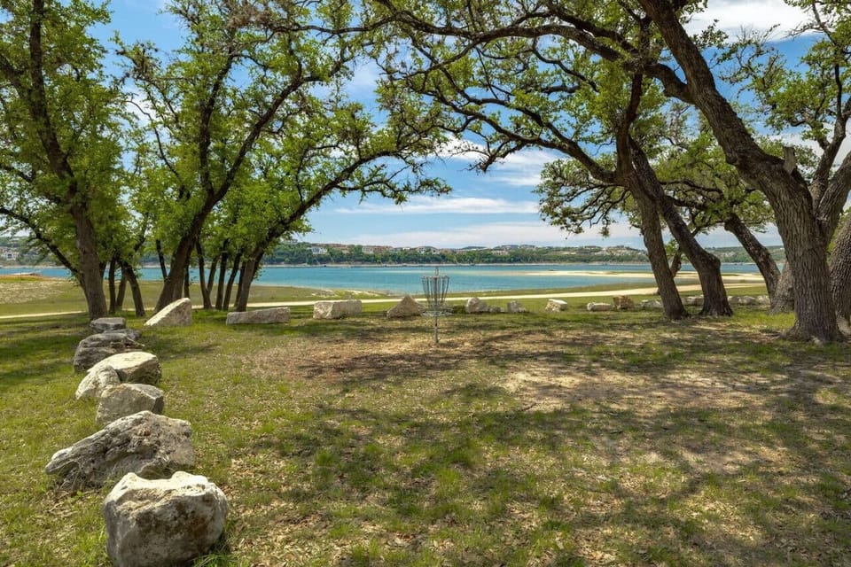 Get outside in Point Venture—enjoy neighborhood disc golf with beautiful Lake Travis views just minutes from Hogan Hideaway.