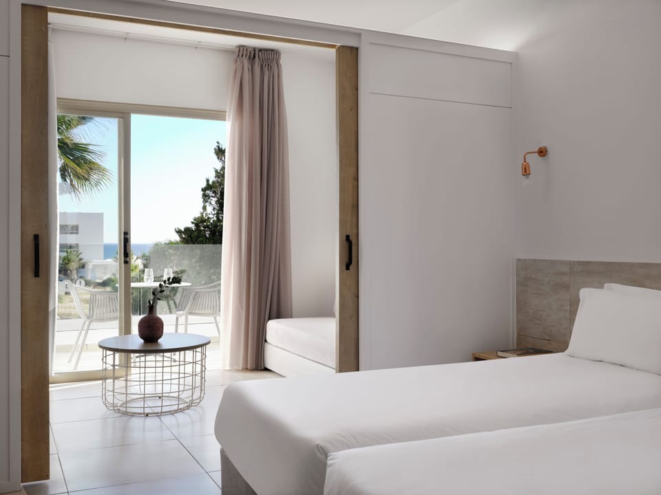 Family Room Side Sea View | Minibar, in-room safe, free cribs/infant beds, free WiFi