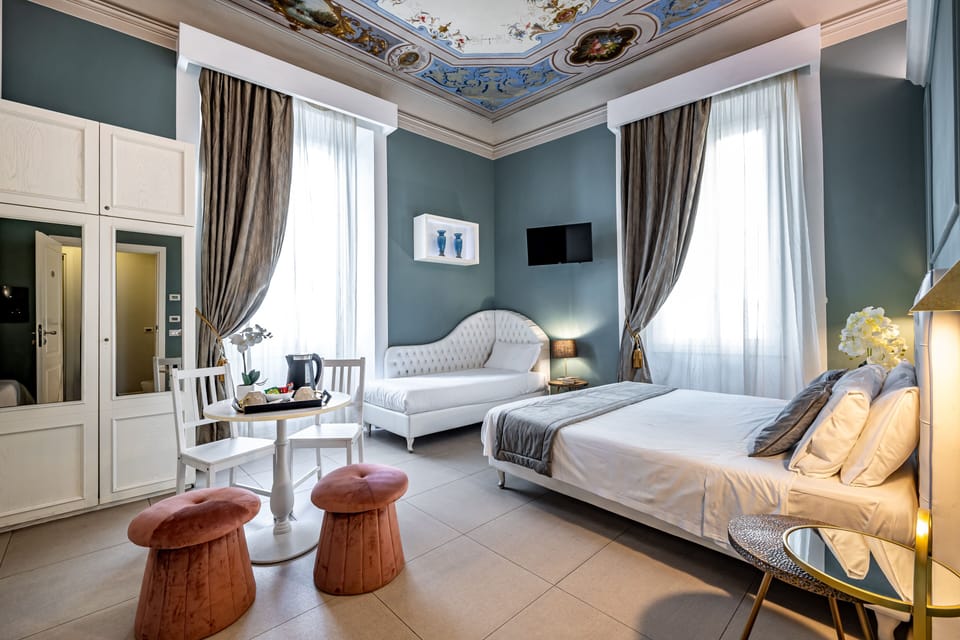 Quadruple Room | Hypo-allergenic bedding, down comforters, minibar, in-room safe