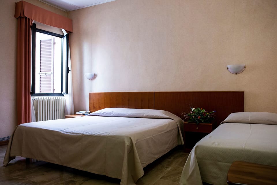 Triple Room | Desk, cribs/infant beds, free WiFi