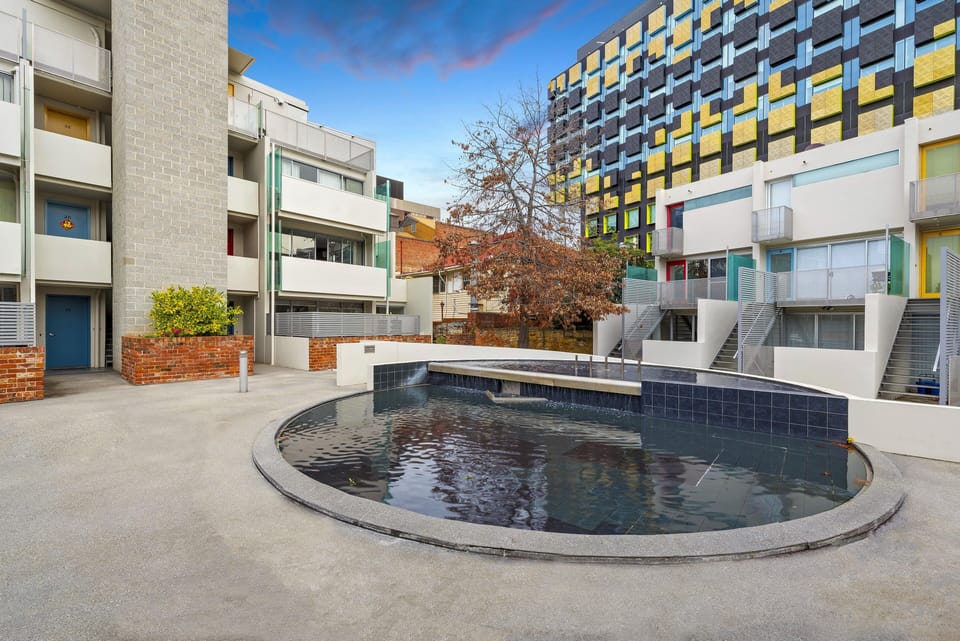 Communal area with fountain & access to Hospital, Theatre Royal, and Royal Arts.