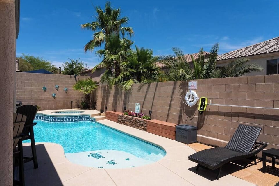 Alternate view of the pool and hot tub.  Plenty of seating for everyone