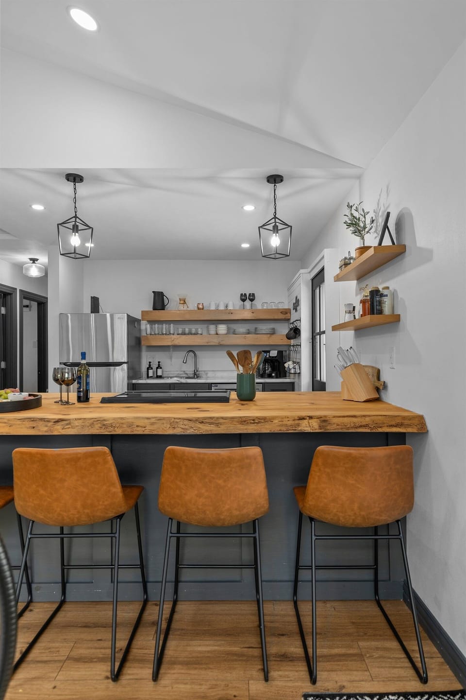 Gather around the island for coffee, cocktails, and conversation