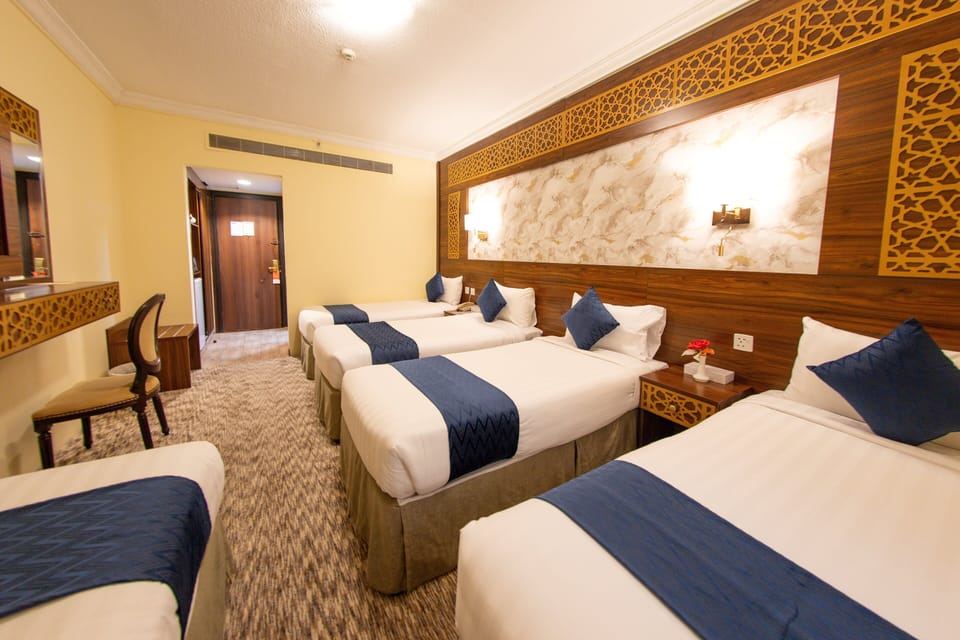 Premium Room, Multiple Beds | Premium bedding, in-room safe, iron/ironing board, bed sheets