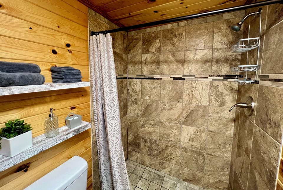There is nothing tiny about this fully-tiled shower.