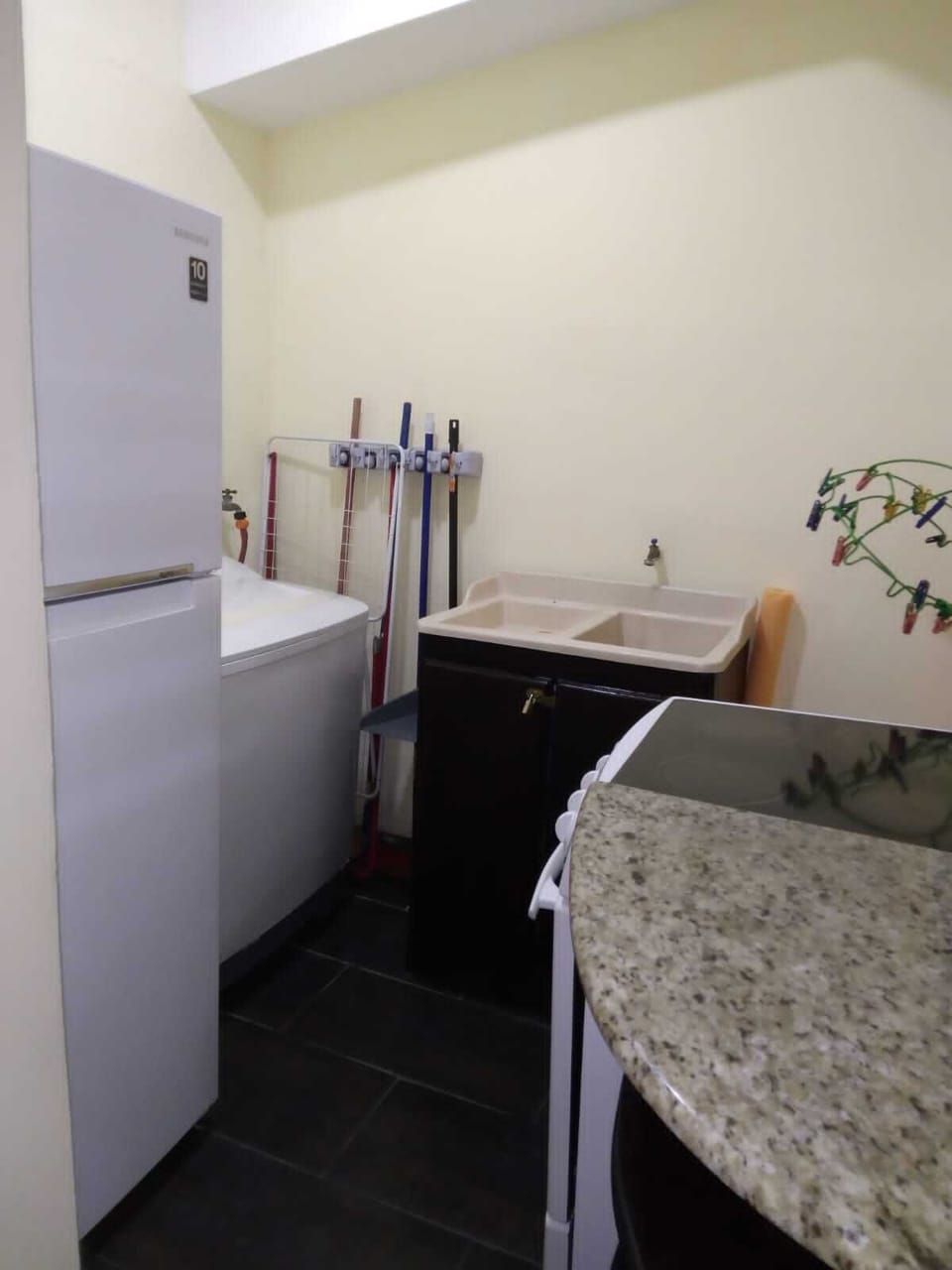 Laundry machine and sink space and stove and refrigerator