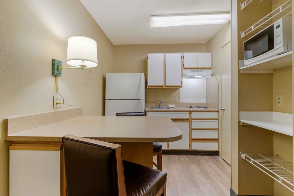 Studio, 1 Queen Bed, Non Smoking | Private kitchen | Fridge, microwave, stovetop, coffee/tea maker