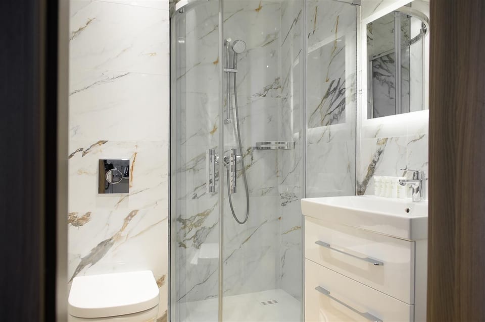 Shower, hair dryer, soap, shampoo