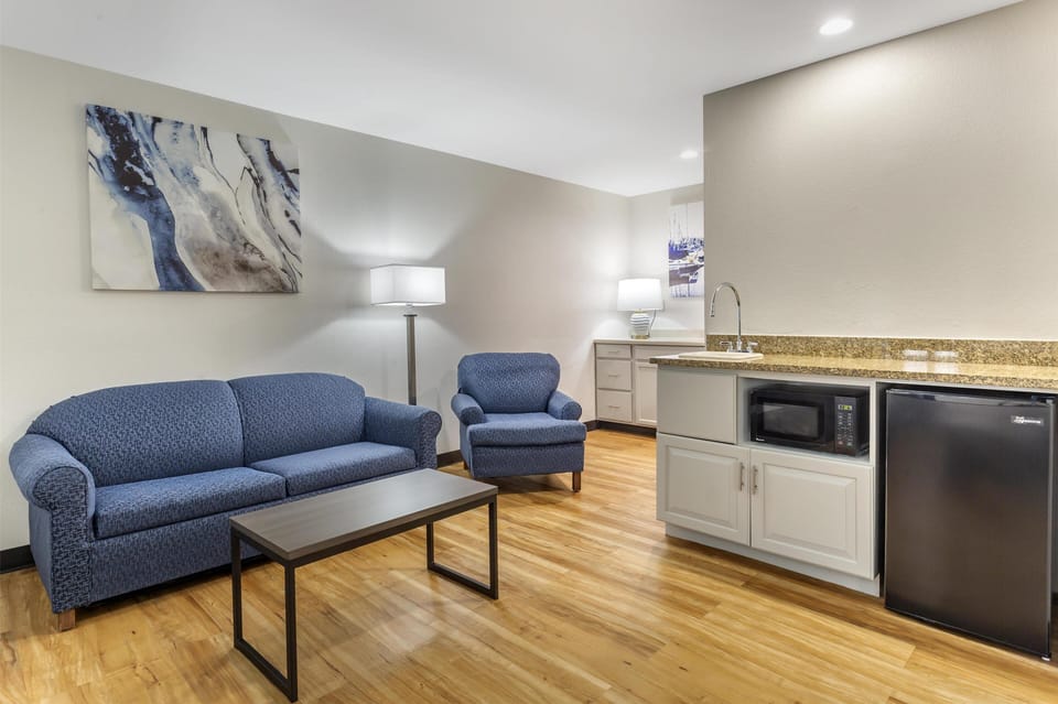 Suite, 2 Queen Beds, Non Smoking, Refrigerator & Microwave (Living Room;with Sofabed) | In-room safe, desk, laptop workspace, blackout drapes