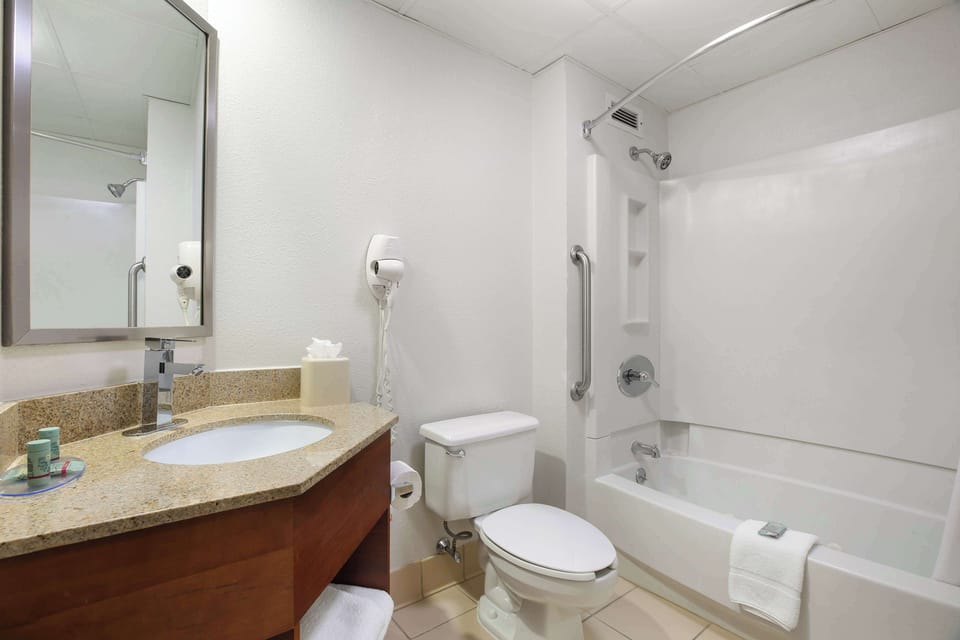Combined shower/tub, eco-friendly toiletries, hair dryer, towels