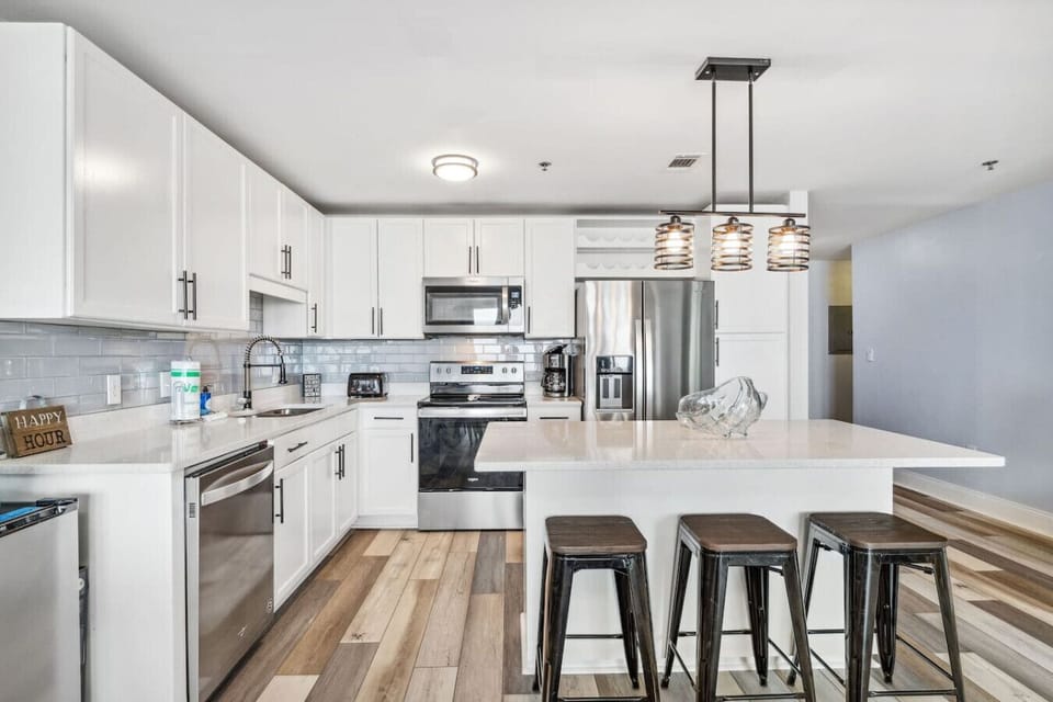 Fully Stocked Kitchen with Ocean Views and Island Bar Seating