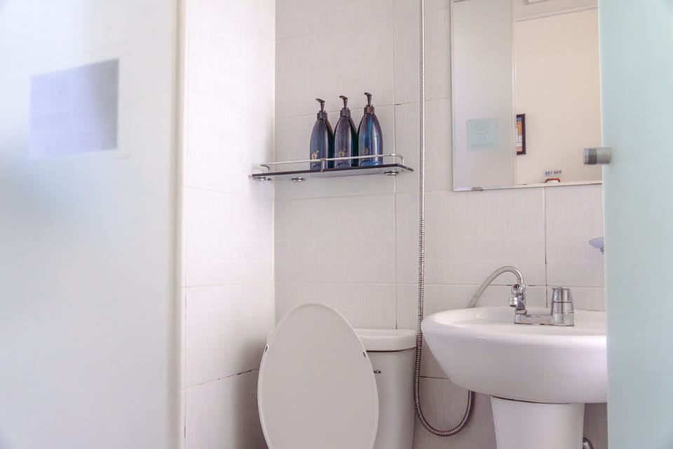 Shower, free toiletries, hair dryer, slippers