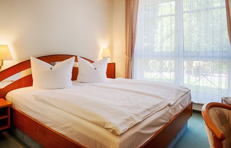 Double Room | Minibar, in-room safe, desk, laptop workspace