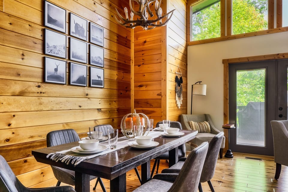 mDining for 6 or extend the table. You can also add the kitchen table to the end. Extra chairs provided to accommodate your entire group.