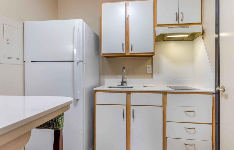 Studio, 1 Queen Bed, Non Smoking | Private kitchen | Full-size fridge, microwave, stovetop, coffee/tea maker