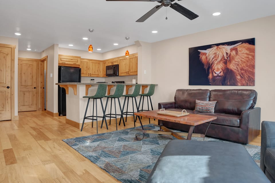 Hardwood floors throughout kitchen and living room, kitchen opens up to the living room