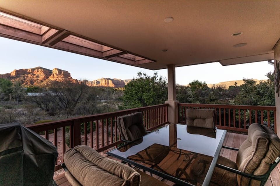 Back patio includes a comfortable patio set perfect for morning coffee or BBQ