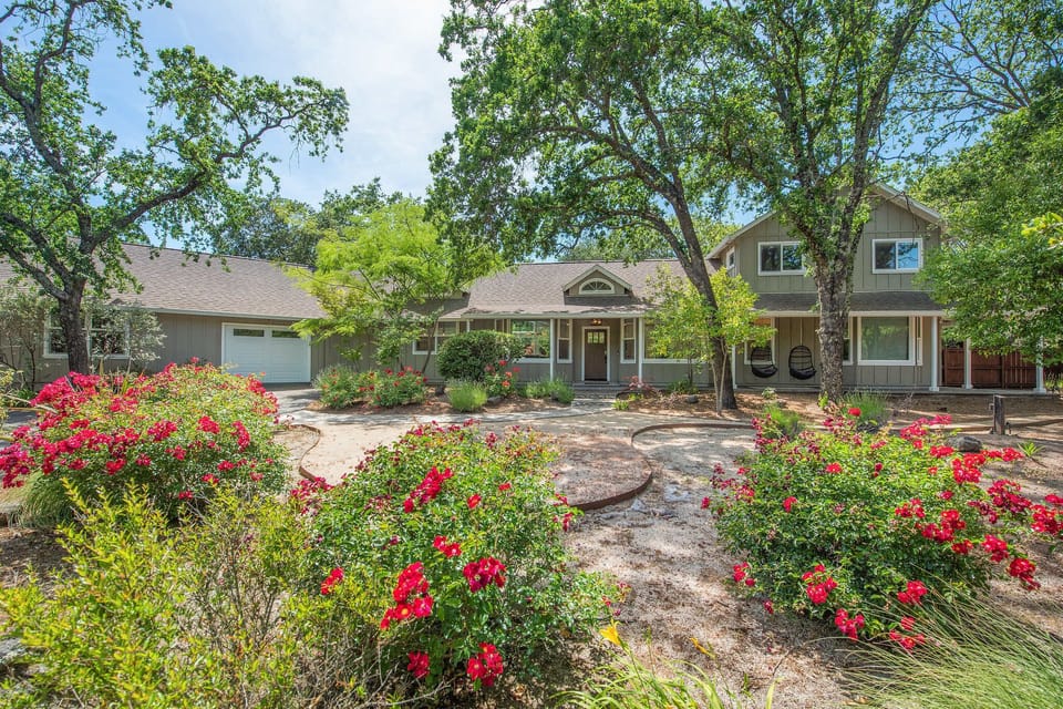 Front of the house with gardens